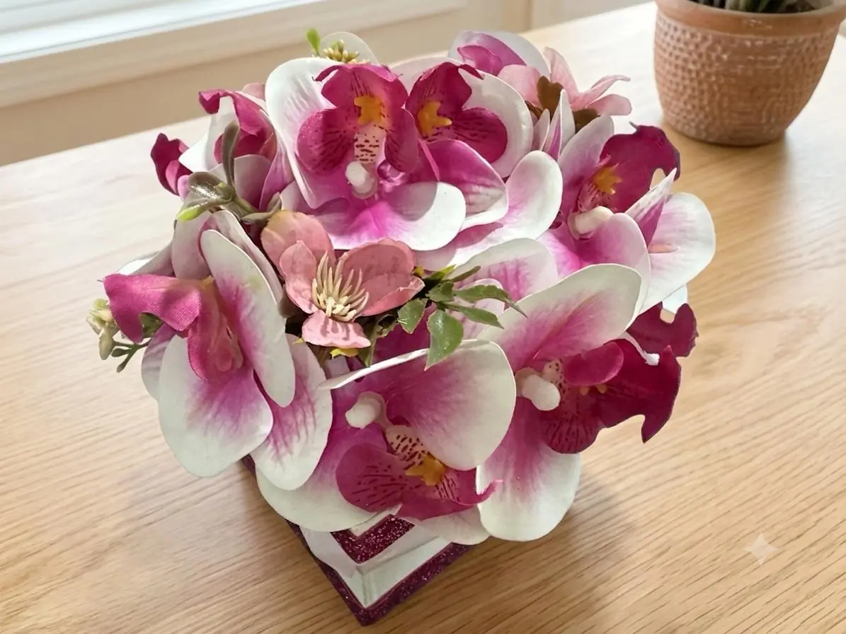 Ramo compacto de orquídeas rosas